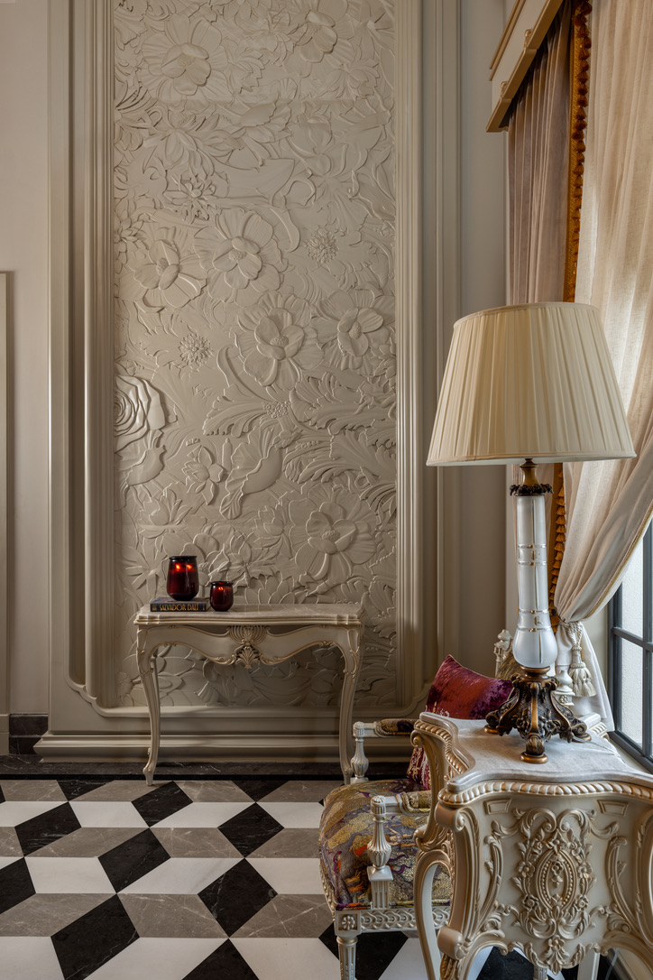 Hand-carved plaster floral relief panel
